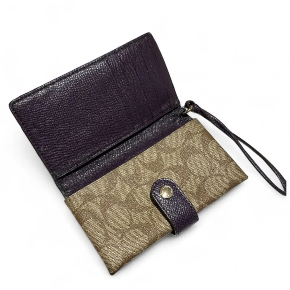Coach wristlet wallet tan purple signature C leather